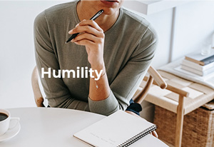 a woman thinking, referring to humility